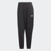 Dámské tepláky adidas WE MIN PT - foto 1